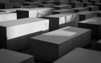 Black and White Photo of Symmetrical Concrete Blocks